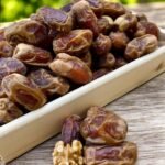 Sugai dates on a wooden tray